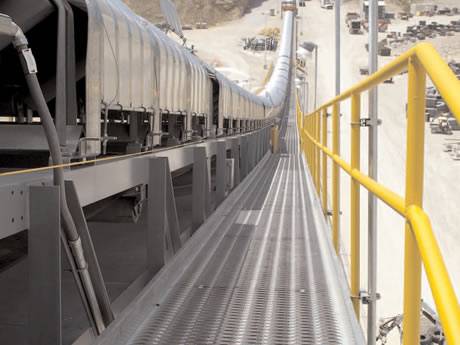 Diamond-Strut catwalk grating along the mining conveyor.
