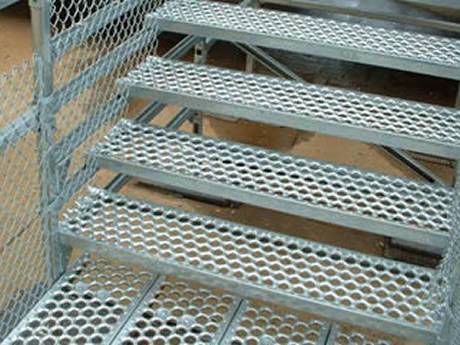 Galvanized steel O-grip grating stair treads durability and cost-effective.