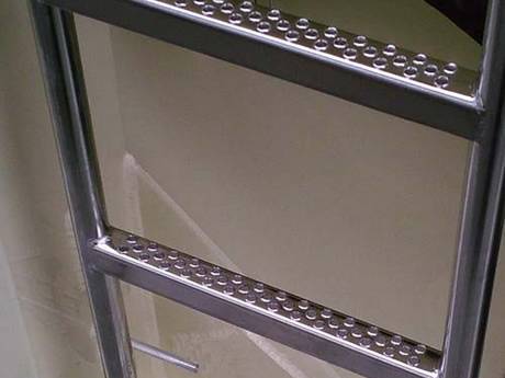 Pre-galvanized Traction-Grip safety grating ladder rungs with three holes for a plant.